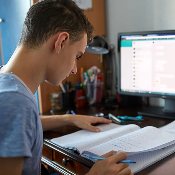 young boy studying